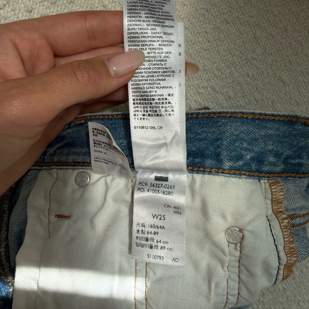 Levi's Light Blue Distressed Denim Cutoff Shorts - Picture 3 of 5